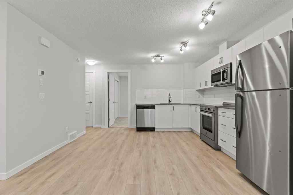 MLS® A2237950 - 414 Cranbrook Square SE in Cranston Calgary, Residential