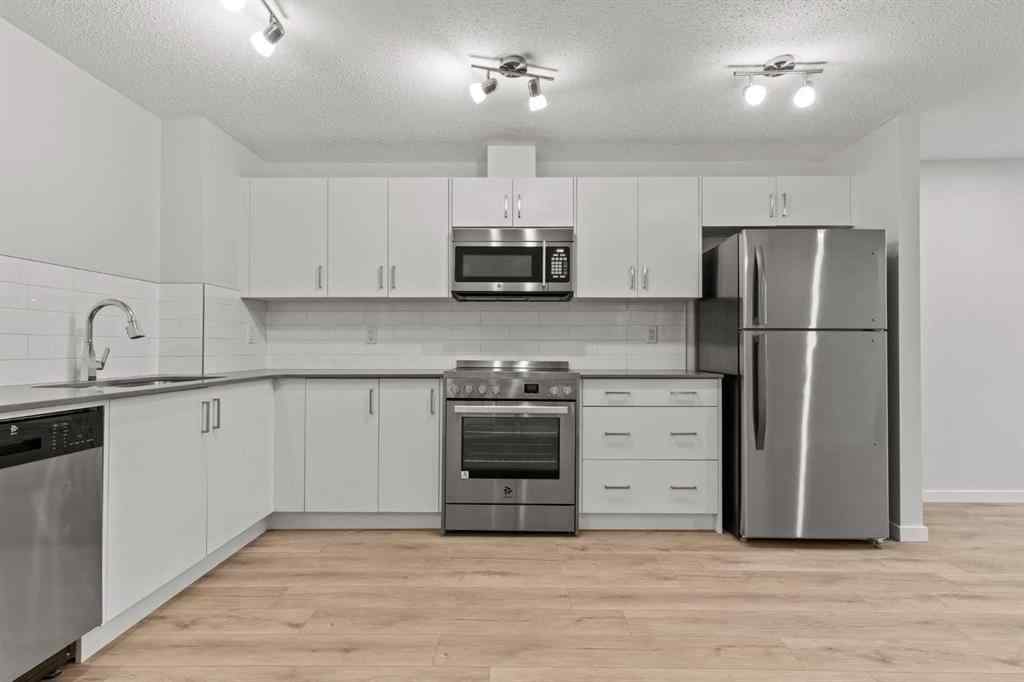 MLS® A2237950 - 414 Cranbrook Square SE in Cranston Calgary, Residential