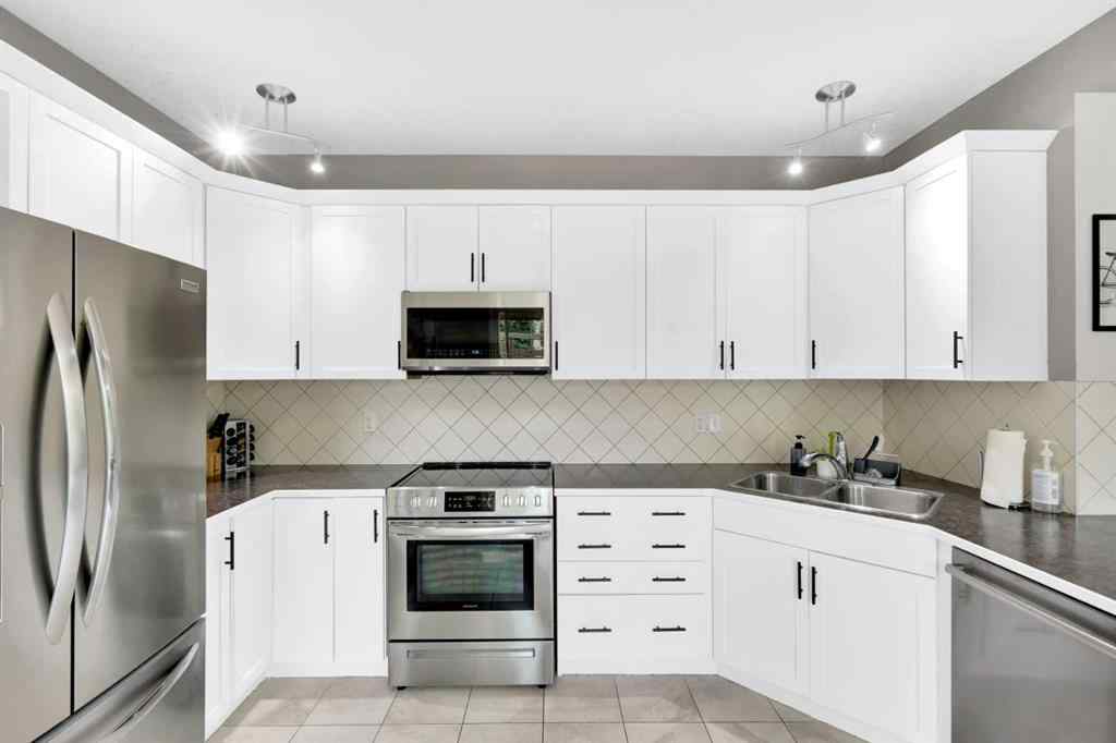 MLS® A2238021 - 2020 Windsong Drive SW in Windsong Airdrie, Residential