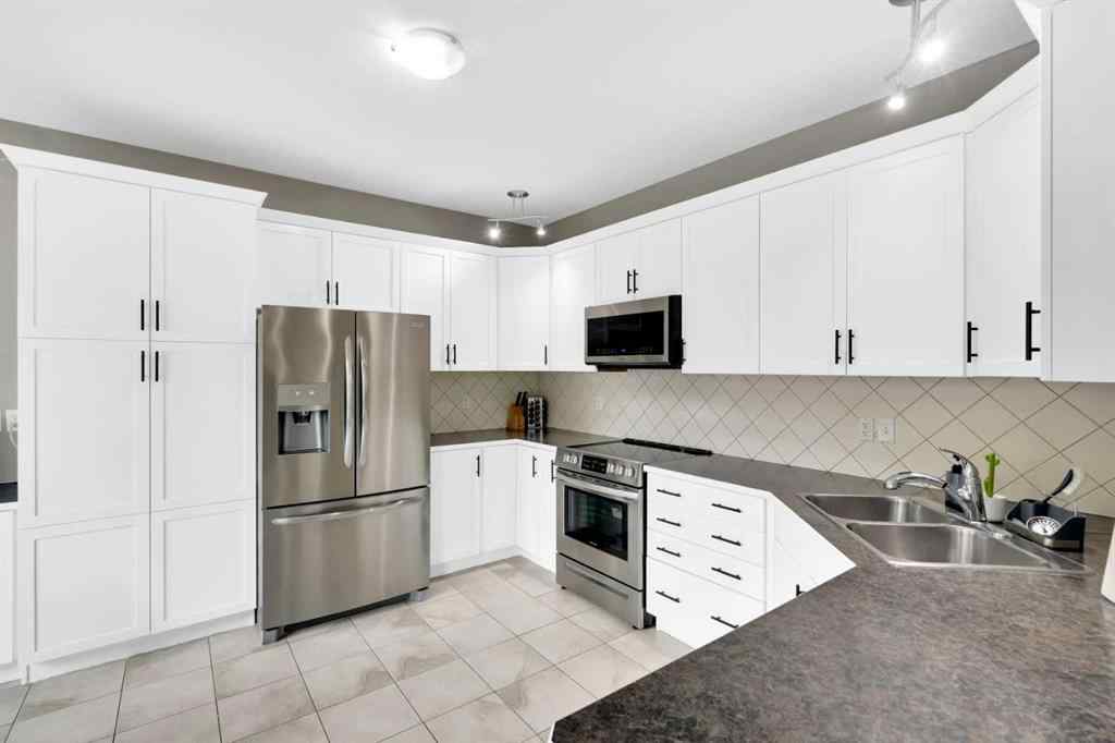 MLS® A2238021 - 2020 Windsong Drive SW in Windsong Airdrie, Residential