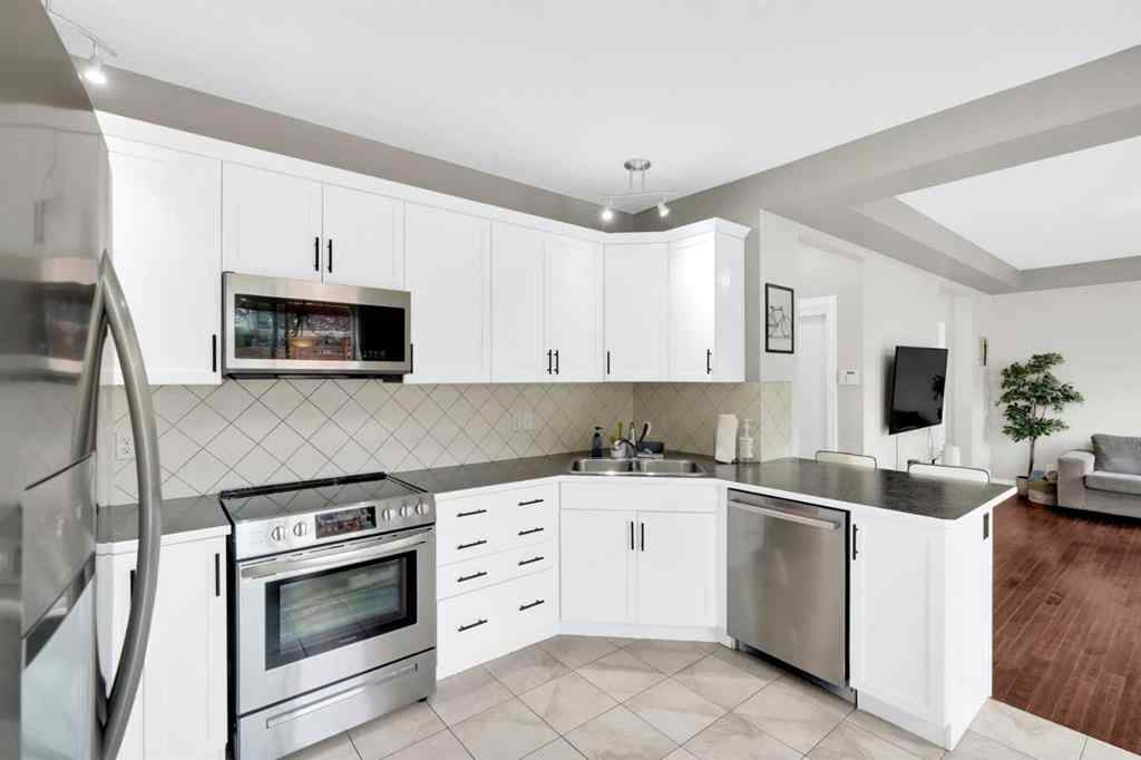MLS® A2238021 - 2020 Windsong Drive SW in Windsong Airdrie, Residential