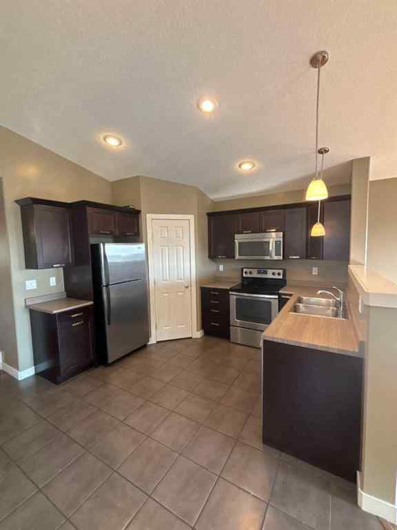 MLS® A2238024 - 7310 115A Street  in Westpointe Grande Prairie, Residential