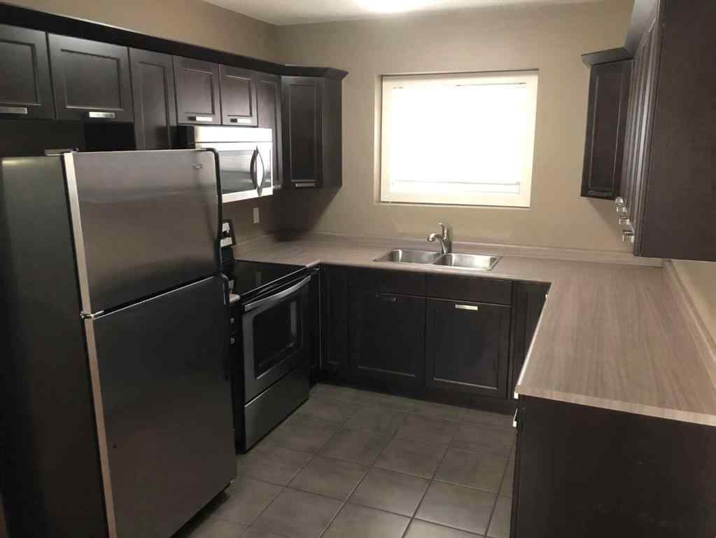 MLS® A2238024 - 7310 115A Street  in Westpointe Grande Prairie, Residential