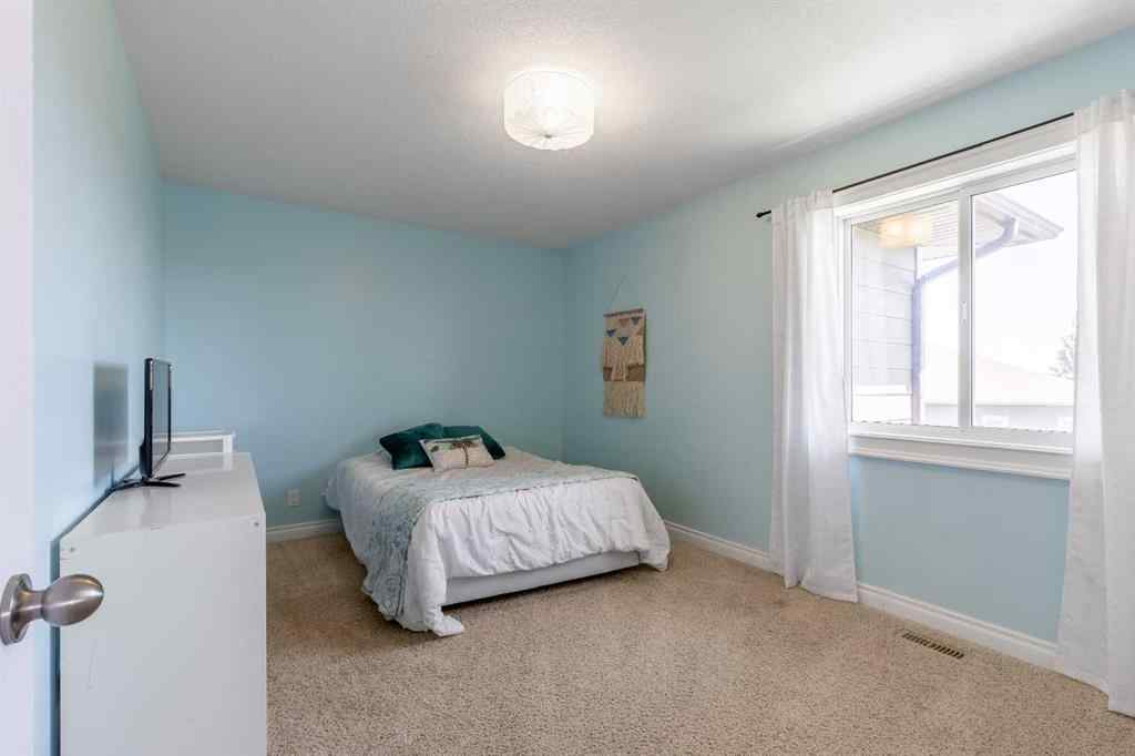 MLS® A2238141 - 409 Arbourwood Terrace S in Arbour Ridge Lethbridge, Residential