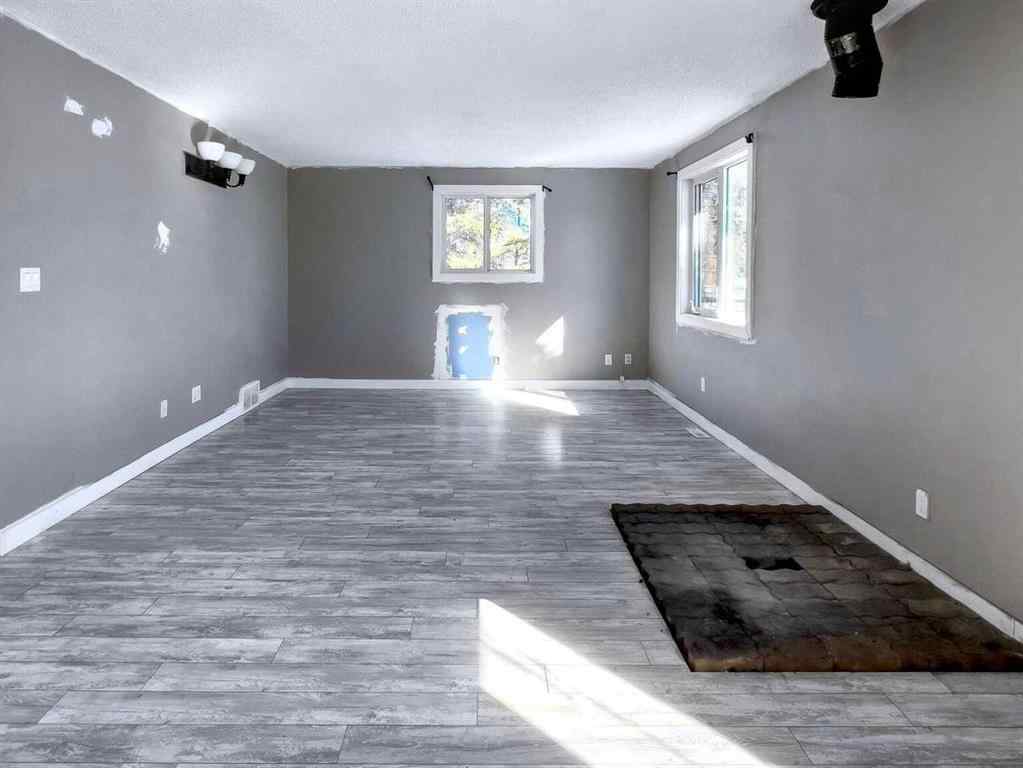 MLS® A2238173 - 57 Poplar Crescent  in Gregoire Lake Gregoire Lake Estates, Residential