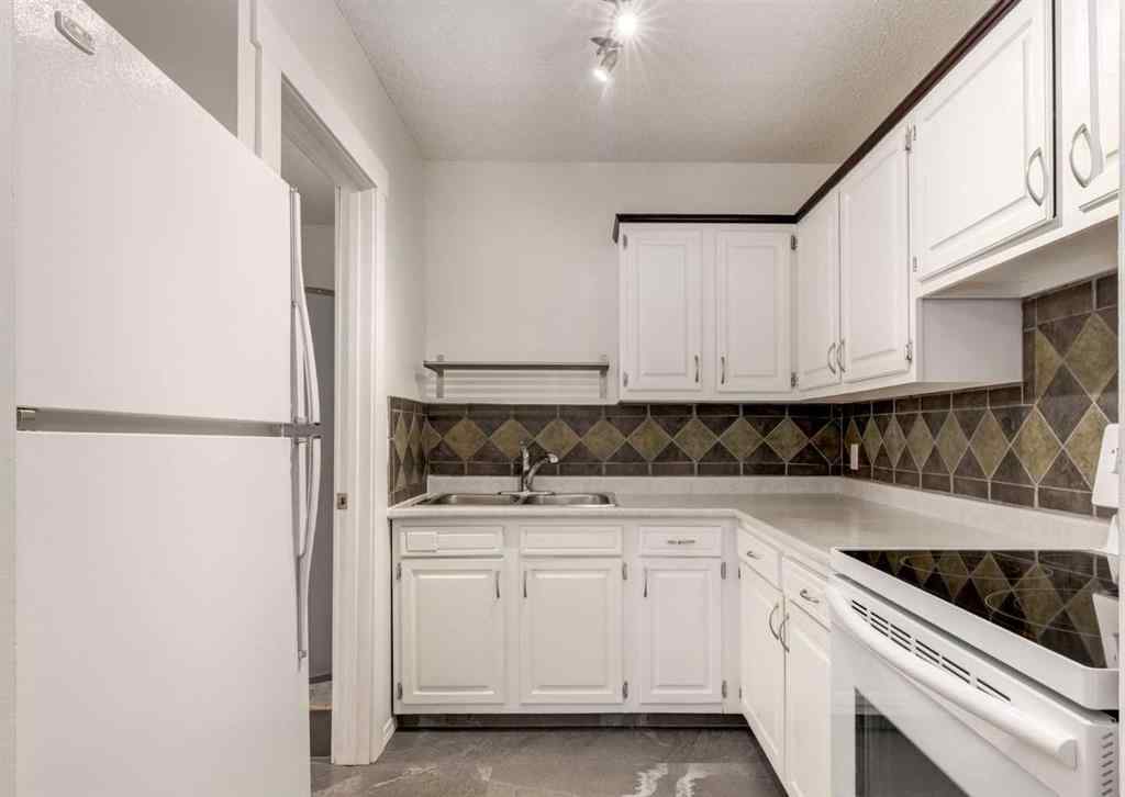 MLS® A2238178 - Unit #206 13104 Elbow Drive SW in Canyon Meadows Calgary, Residential