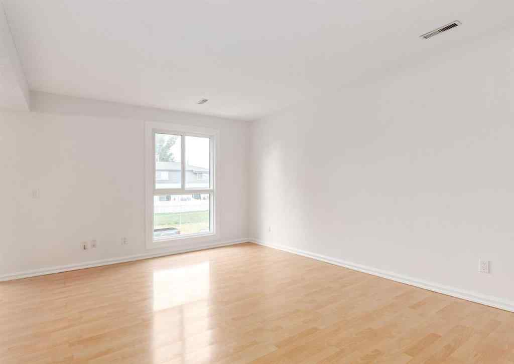 MLS® A2238178 - Unit #206 13104 Elbow Drive SW in Canyon Meadows Calgary, Residential