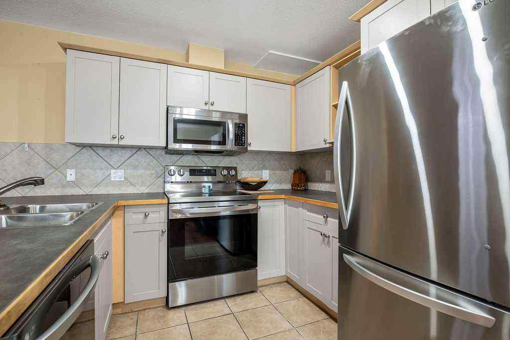 MLS® A2238185 - 90 Cimarron Trail  in Cimarron Okotoks, Residential