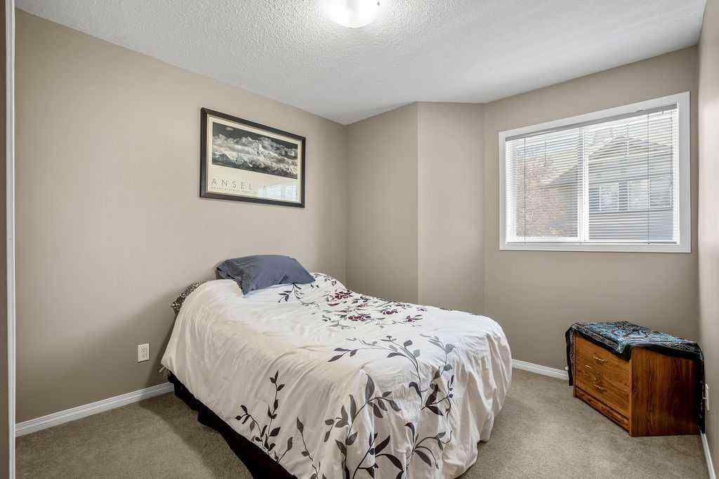 MLS® A2238185 - 90 Cimarron Trail  in Cimarron Okotoks, Residential