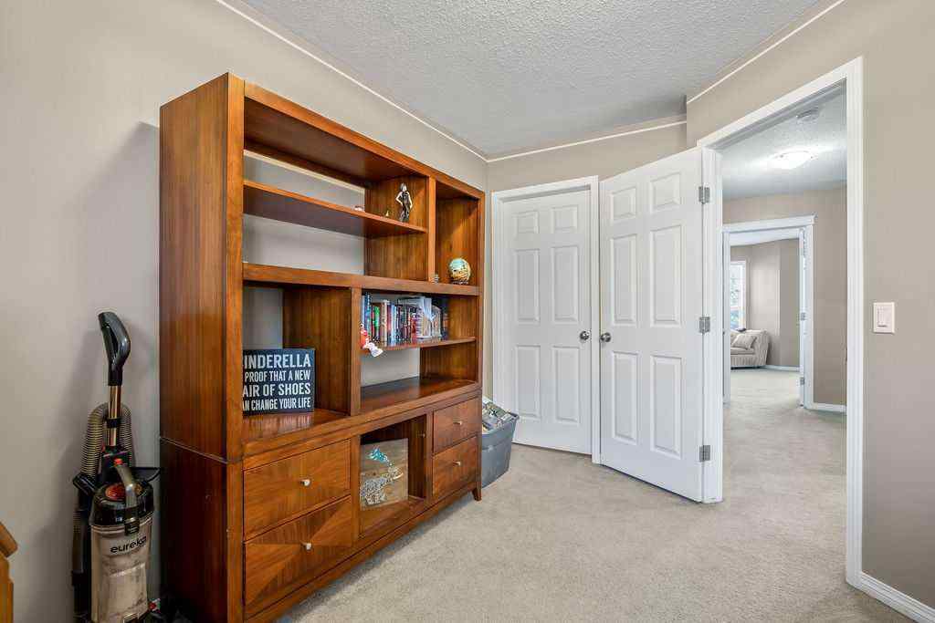 MLS® A2238185 - 90 Cimarron Trail  in Cimarron Okotoks, Residential