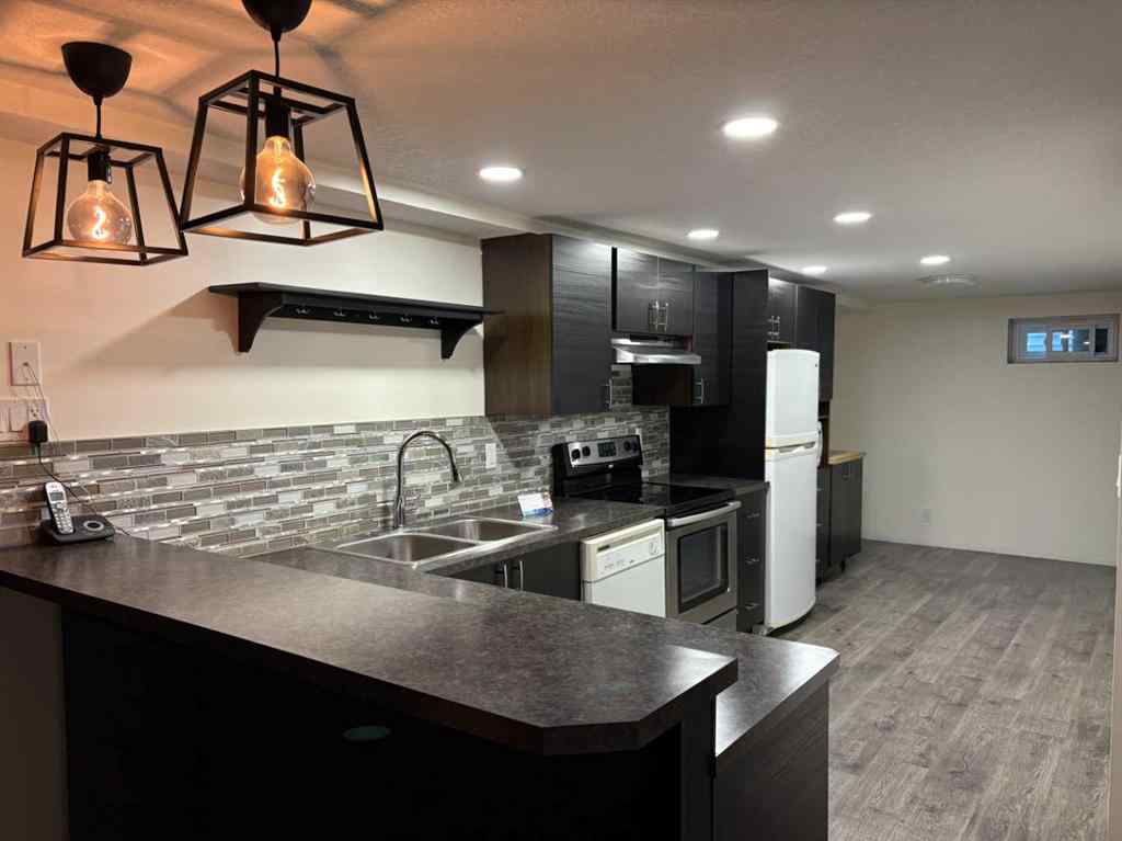 MLS® A2238186 - 73 Kirby Place SW in Kingsland Calgary, Residential
