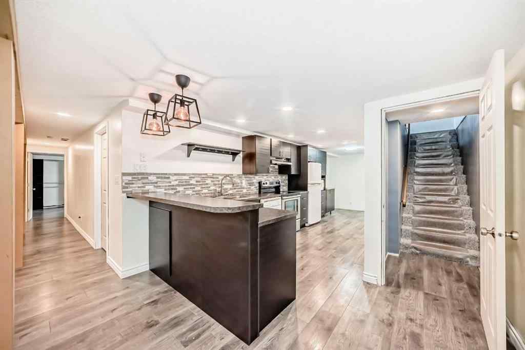 MLS® A2238186 - 73 Kirby Place SW in Kingsland Calgary, Residential