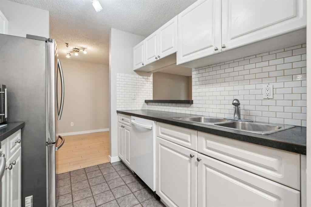 MLS® A2238274 - Unit #106 1735 11 Avenue SW in Sunalta Calgary, Residential
