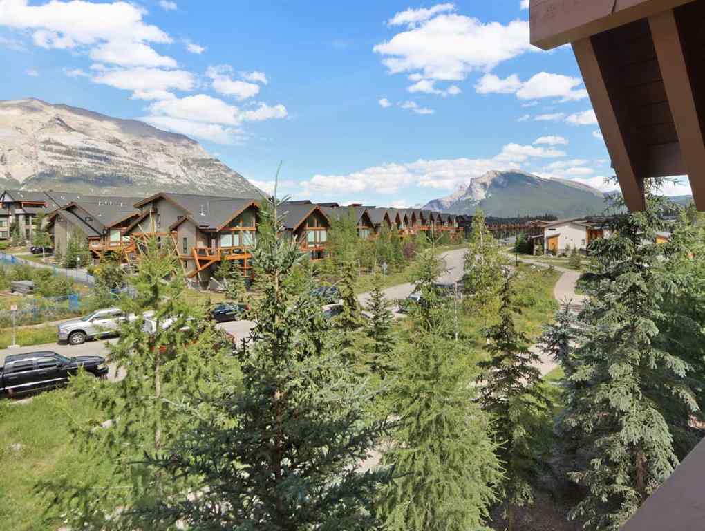 MLS® A2238277 - Unit #303 106 Stewart Creek Landing  in Three Sisters Canmore, Residential