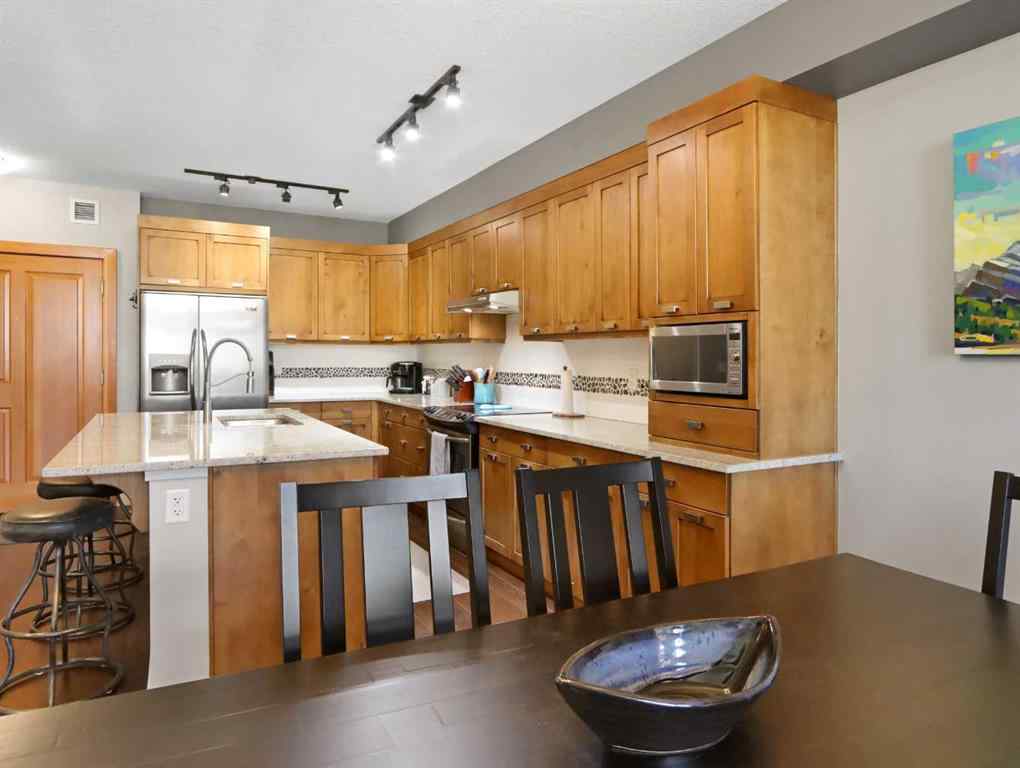 MLS® A2238277 - Unit #303 106 Stewart Creek Landing  in Three Sisters Canmore, Residential