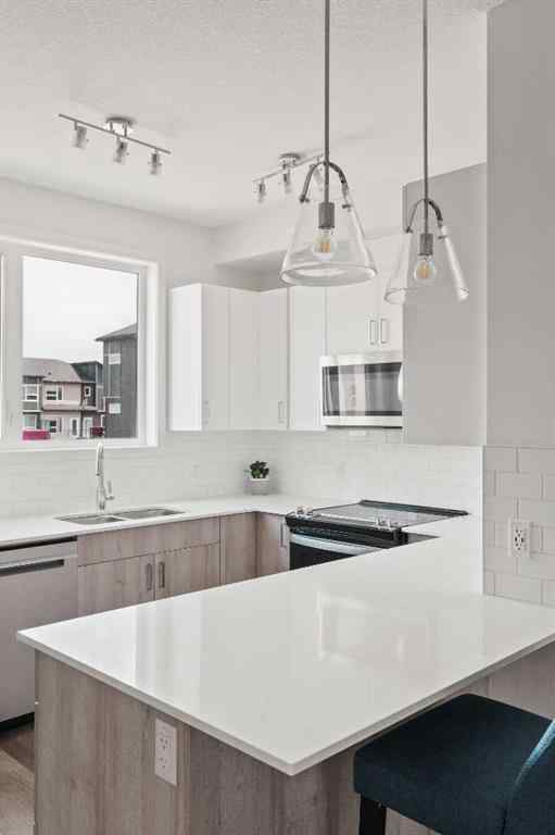 MLS® A2238287 - Unit #405 301 Redstone Boulevard NE in Redstone Calgary, Residential