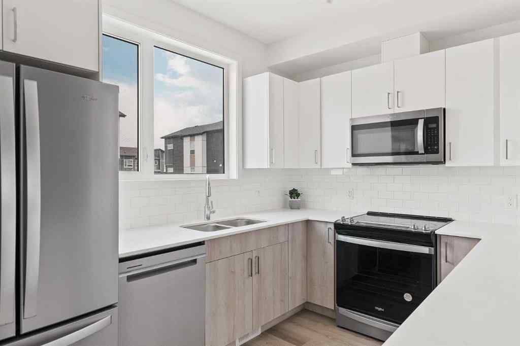 MLS® A2238287 - Unit #405 301 Redstone Boulevard NE in Redstone Calgary, Residential