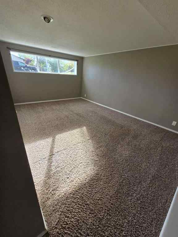 MLS® A2238330 - 8702 96 Street  in Highland Park Grande Prairie, Residential