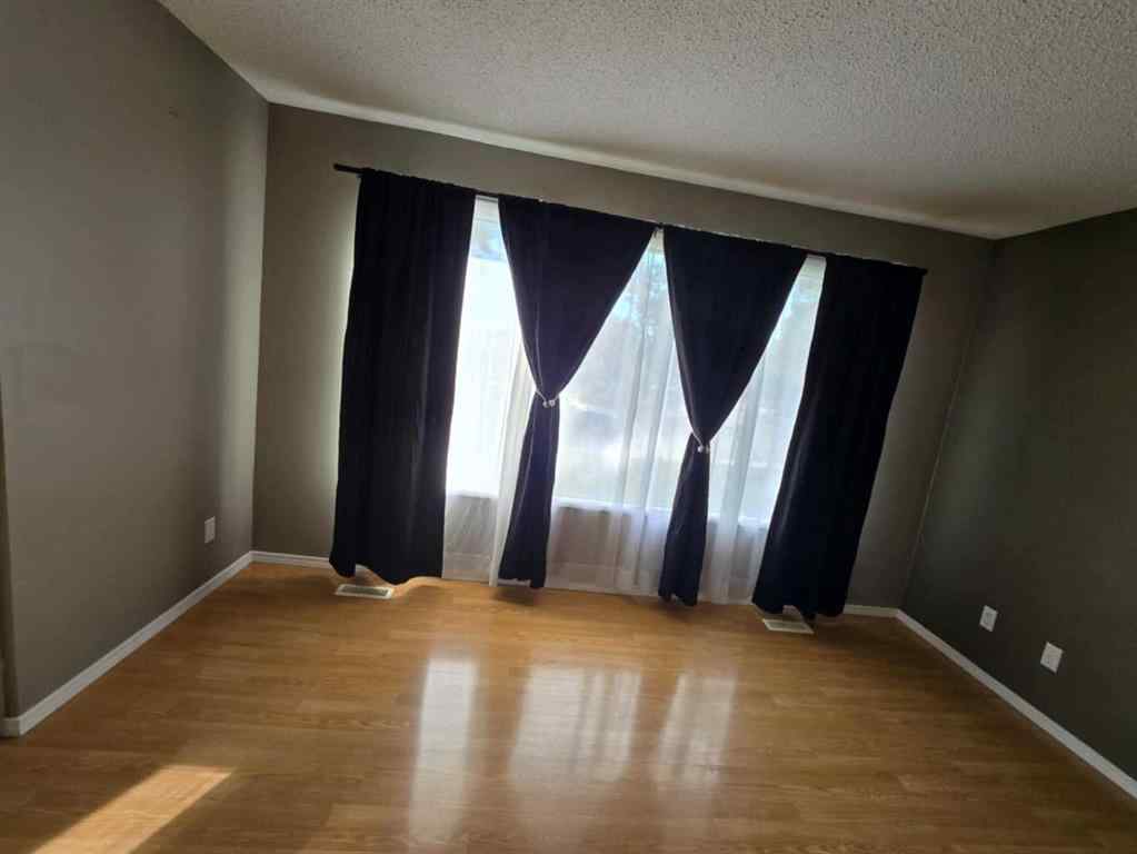 MLS® A2238330 - 8702 96 Street  in Highland Park Grande Prairie, Residential