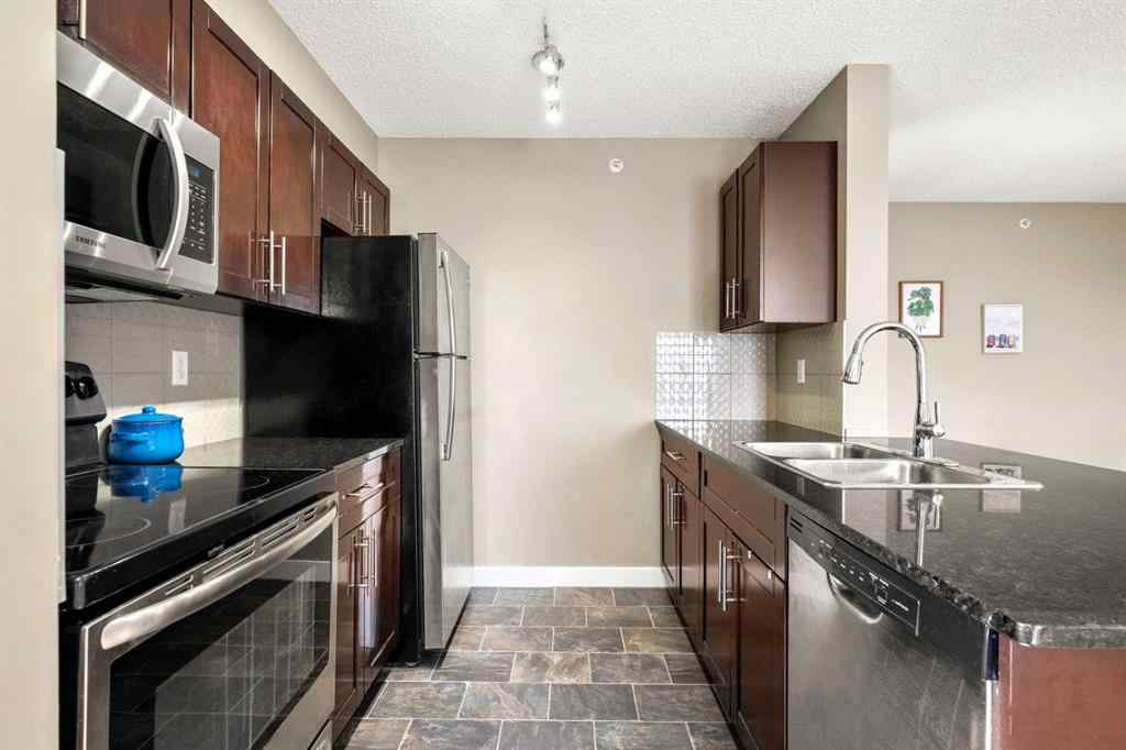 MLS® A2238392 - Unit #419 15 Saddlestone Way NE in Saddle Ridge Calgary, Residential
