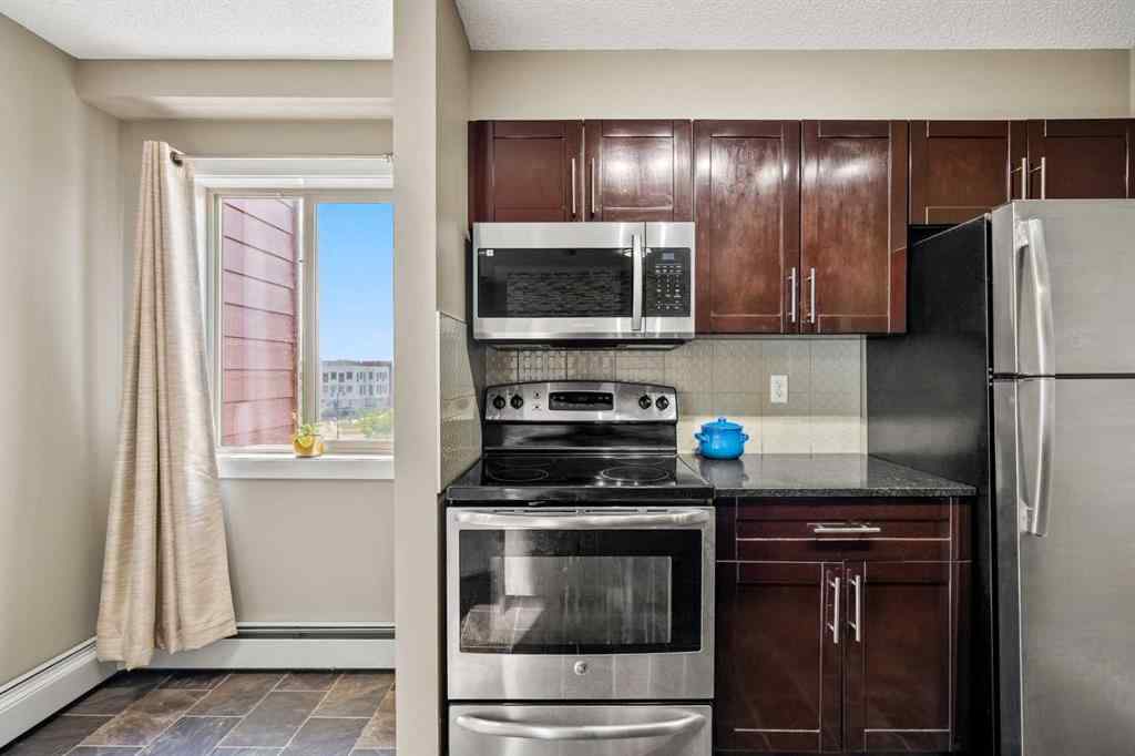 MLS® A2238392 - Unit #419 15 Saddlestone Way NE in Saddle Ridge Calgary, Residential