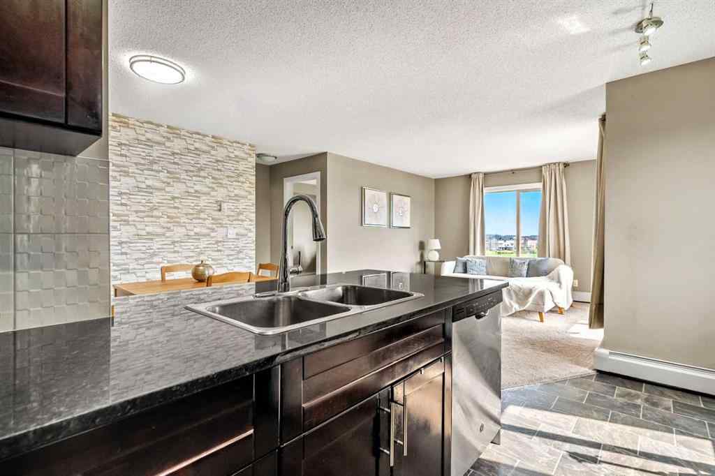 MLS® A2238392 - Unit #419 15 Saddlestone Way NE in Saddle Ridge Calgary, Residential