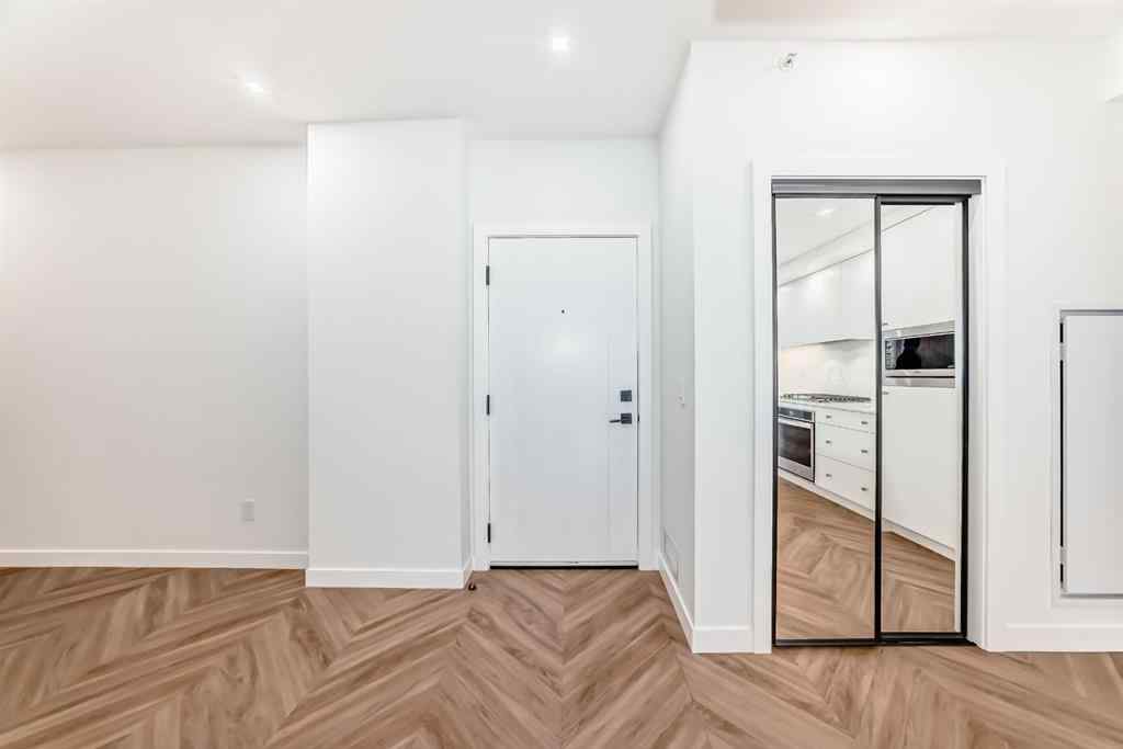 MLS® A2238449 - Unit #413 8445 Broadcast Avenue SW in West Springs Calgary, Residential
