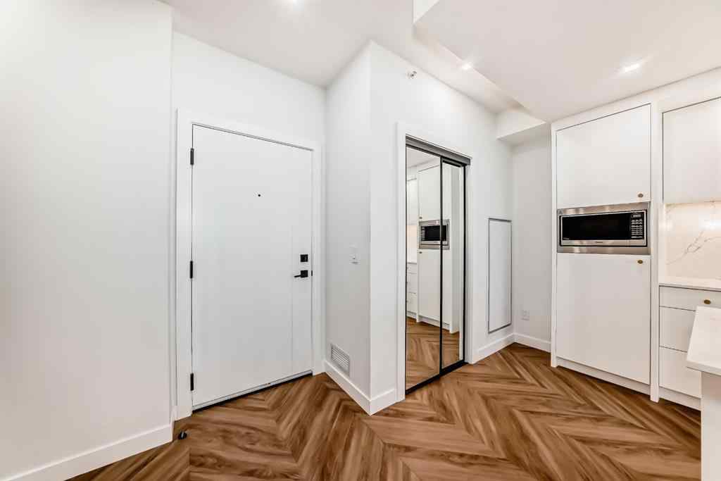 MLS® A2238449 - Unit #413 8445 Broadcast Avenue SW in West Springs Calgary, Residential