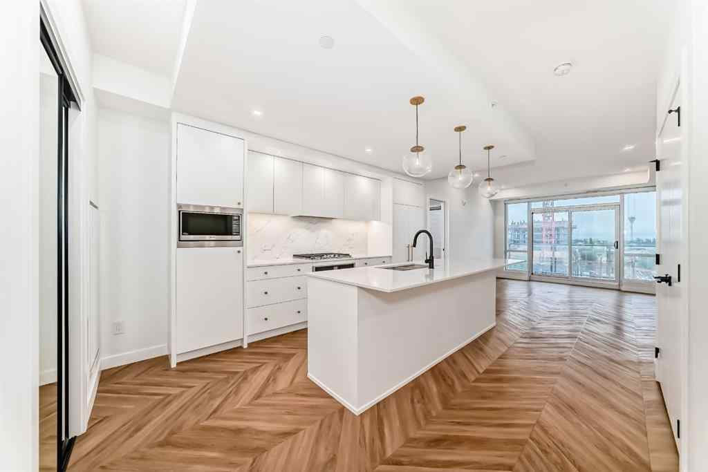 MLS® A2238449 - Unit #413 8445 Broadcast Avenue SW in West Springs Calgary, Residential