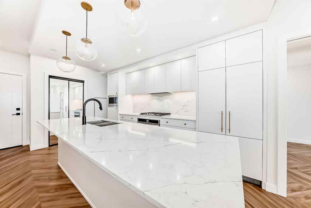 MLS® A2238449 - Unit #413 8445 Broadcast Avenue SW in West Springs Calgary, Residential