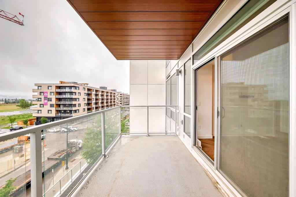 MLS® A2238449 - Unit #413 8445 Broadcast Avenue SW in West Springs Calgary, Residential