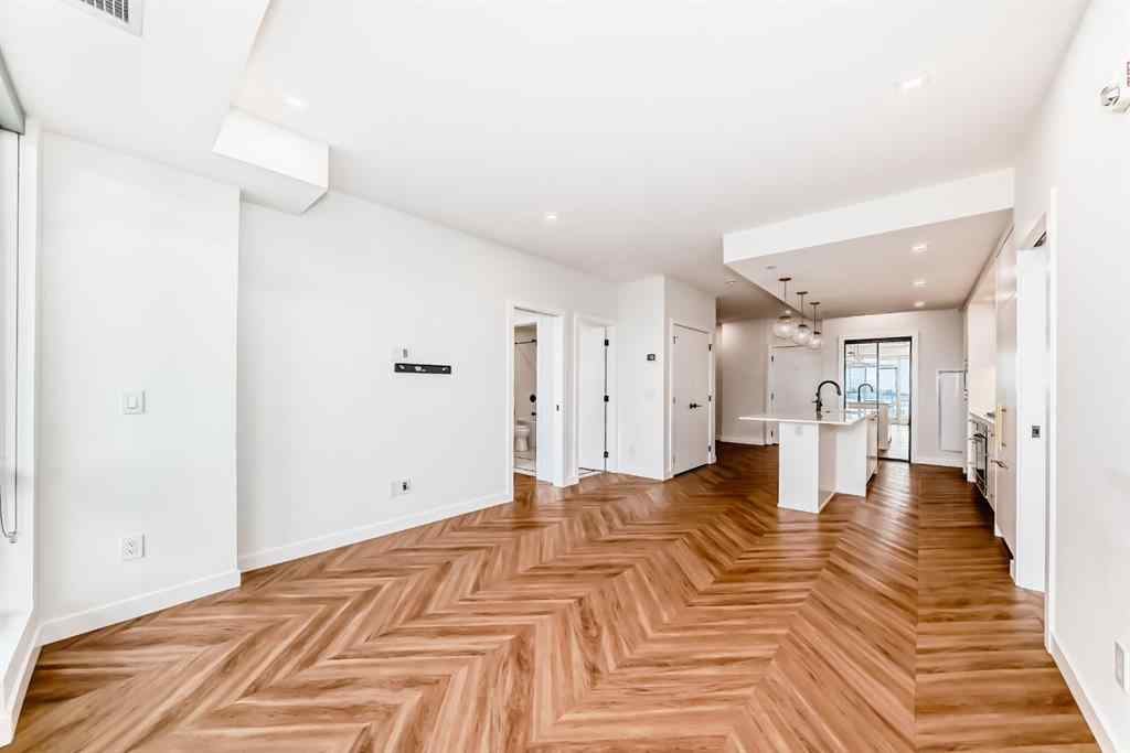 MLS® A2238449 - Unit #413 8445 Broadcast Avenue SW in West Springs Calgary, Residential
