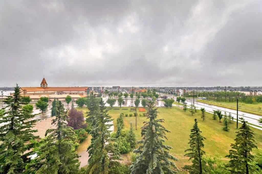 MLS® A2238482 - Unit #410 8505 Broadcast Avenue SW in West Springs Calgary, Residential