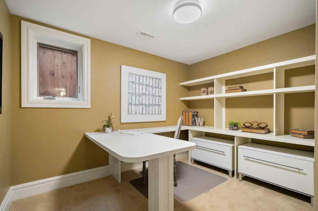MLS® A2238513 - 36 Baycrest Place SW in Bayview Calgary, Residential