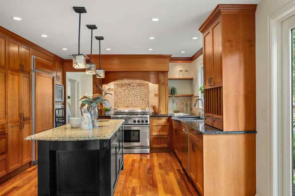 MLS® A2238513 - 36 Baycrest Place SW in Bayview Calgary, Residential