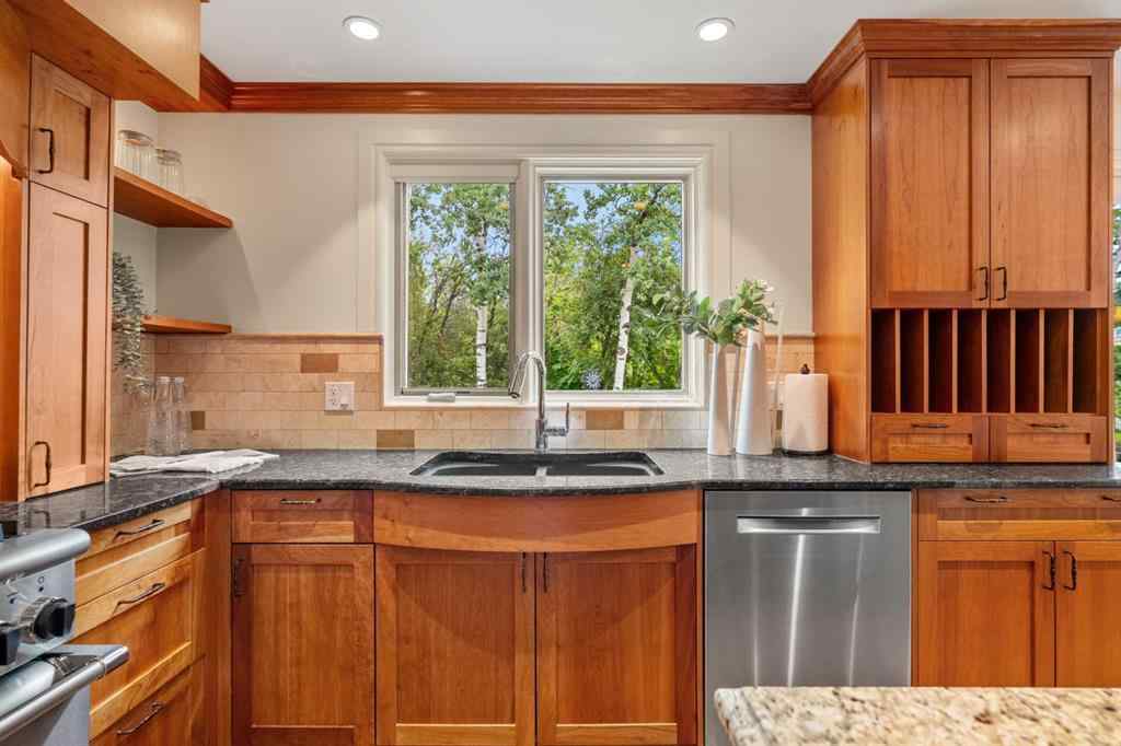 MLS® A2238513 - 36 Baycrest Place SW in Bayview Calgary, Residential