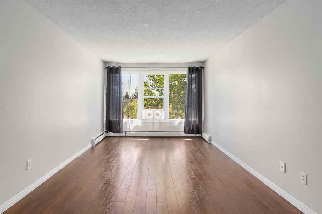 MLS® A2238537 - Unit #221 101 Big Hill Way SE in Big Springs Airdrie, Residential