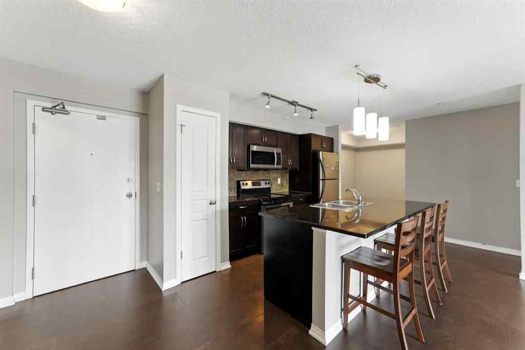 MLS® A2238552 - Unit #206 250 New Brighton Villas SE in New Brighton Calgary, Residential