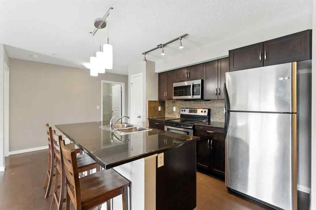 MLS® A2238552 - Unit #206 250 New Brighton Villas SE in New Brighton Calgary, Residential
