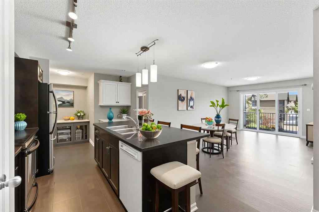MLS® A2238552 - Unit #206 250 New Brighton Villas SE in New Brighton Calgary, Residential