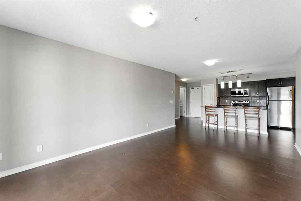 MLS® A2238552 - Unit #206 250 New Brighton Villas SE in New Brighton Calgary, Residential