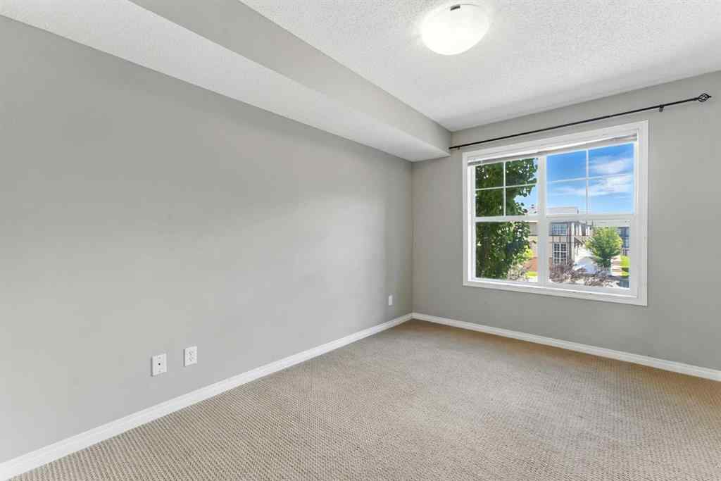 MLS® A2238552 - Unit #206 250 New Brighton Villas SE in New Brighton Calgary, Residential
