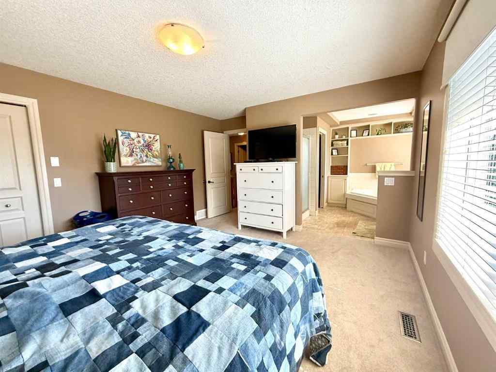 MLS® A2238605 - 215 Hawkmere Road  in Westmere Chestermere, Residential
