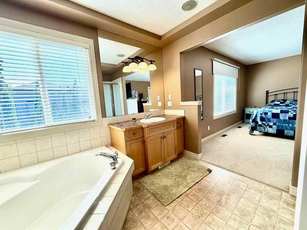 MLS® A2238605 - 215 Hawkmere Road  in Westmere Chestermere, Residential