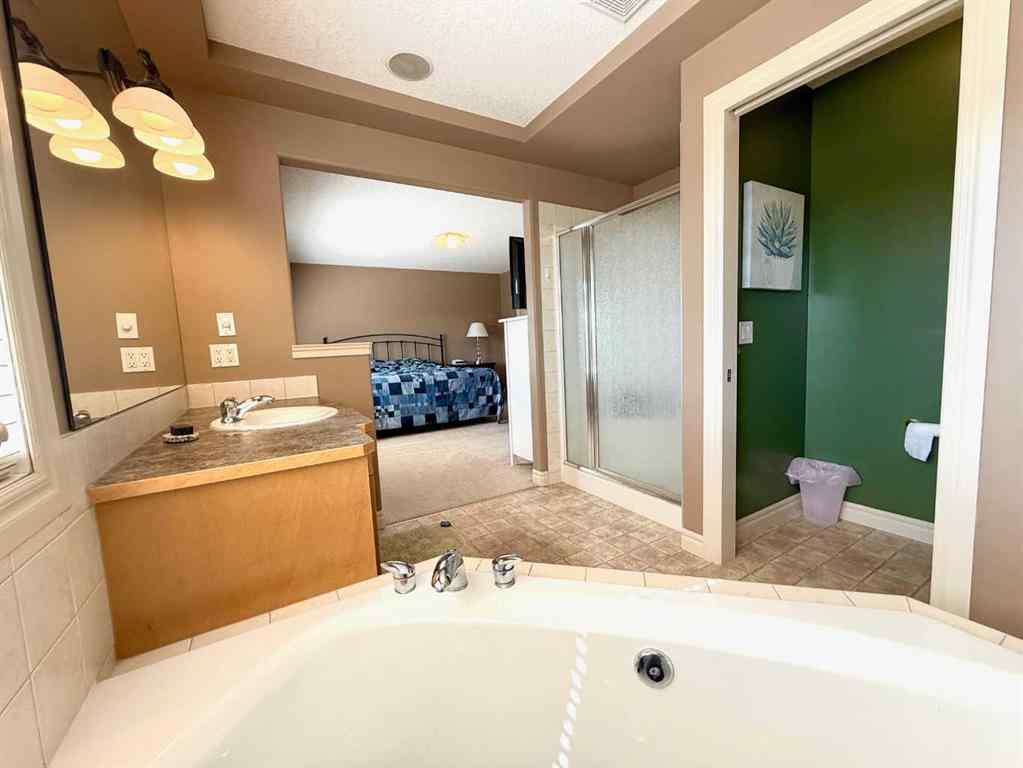 MLS® A2238605 - 215 Hawkmere Road  in Westmere Chestermere, Residential