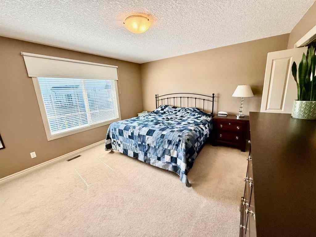 MLS® A2238605 - 215 Hawkmere Road  in Westmere Chestermere, Residential