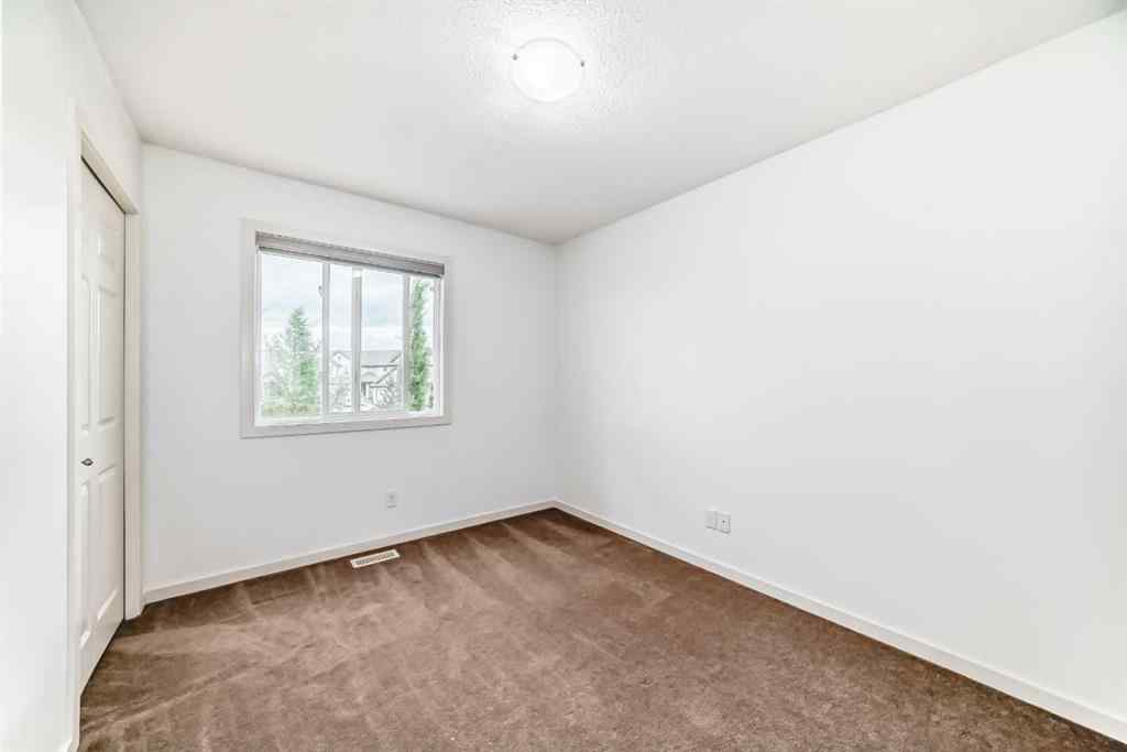 MLS® A2238609 - 24 Sunset Link  in Sunset Ridge Cochrane, Residential