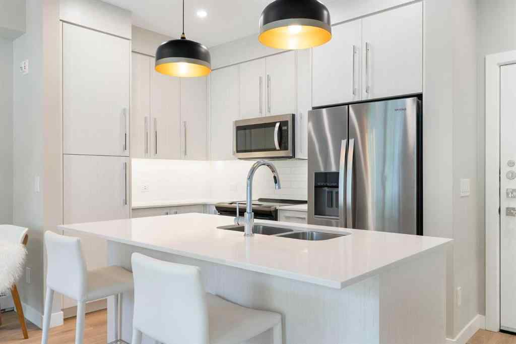 MLS® A2238671 - Unit #110 383 Smith Street NW in University District Calgary, Residential
