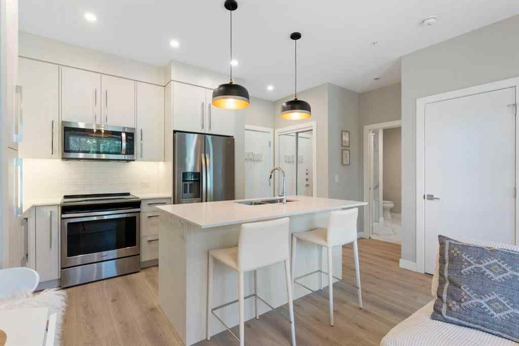 MLS® A2238671 - Unit #110 383 Smith Street NW in University District Calgary, Residential