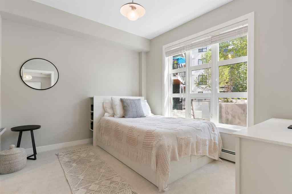 MLS® A2238671 - Unit #110 383 Smith Street NW in University District Calgary, Residential